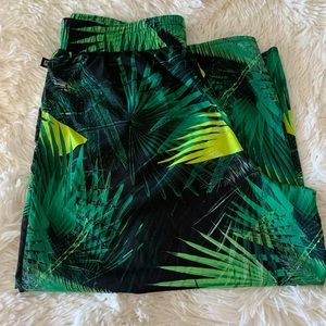 Fabletics Sz M. Breezy Black and Green Leaf Capri pants.